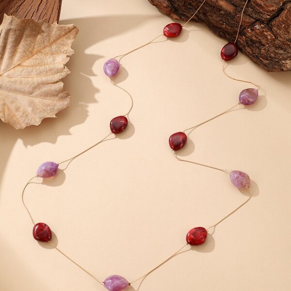 Collier pierres rouge et violet
