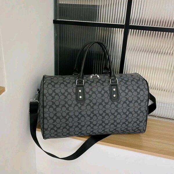 Sac de voyage Coach en cuir