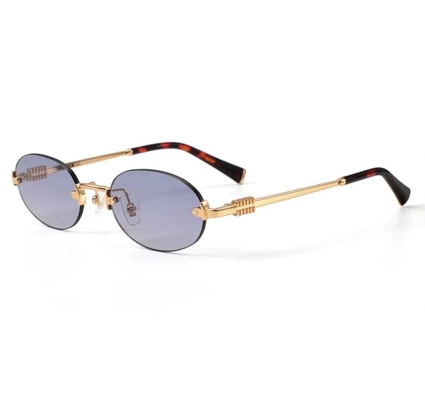 Lunettes de soleil élégantes dorées