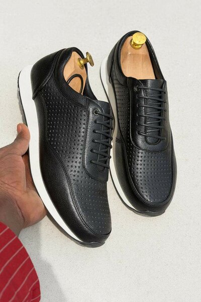 Chaussures de ville en cuir perforé