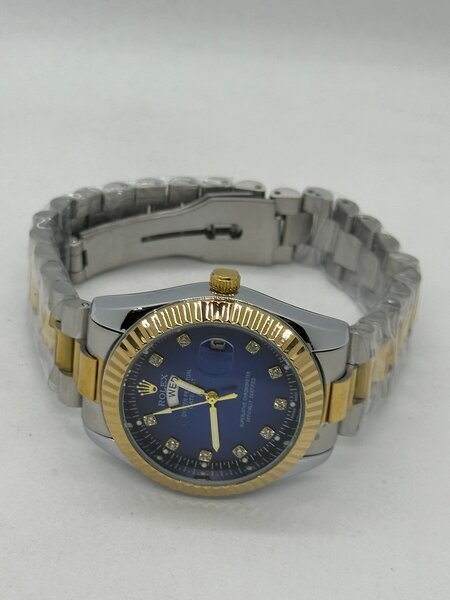 Montre homme luxe acier doré