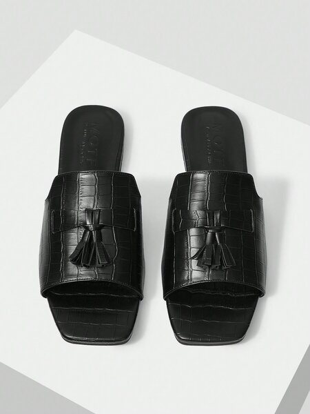 Mules femme en cuir noir