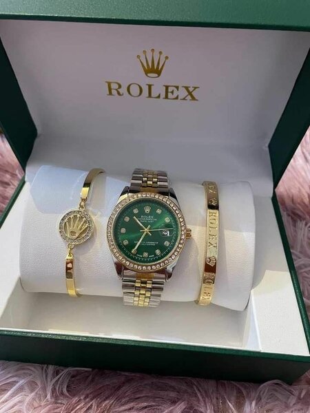 Montre Rolex luxe verte et or