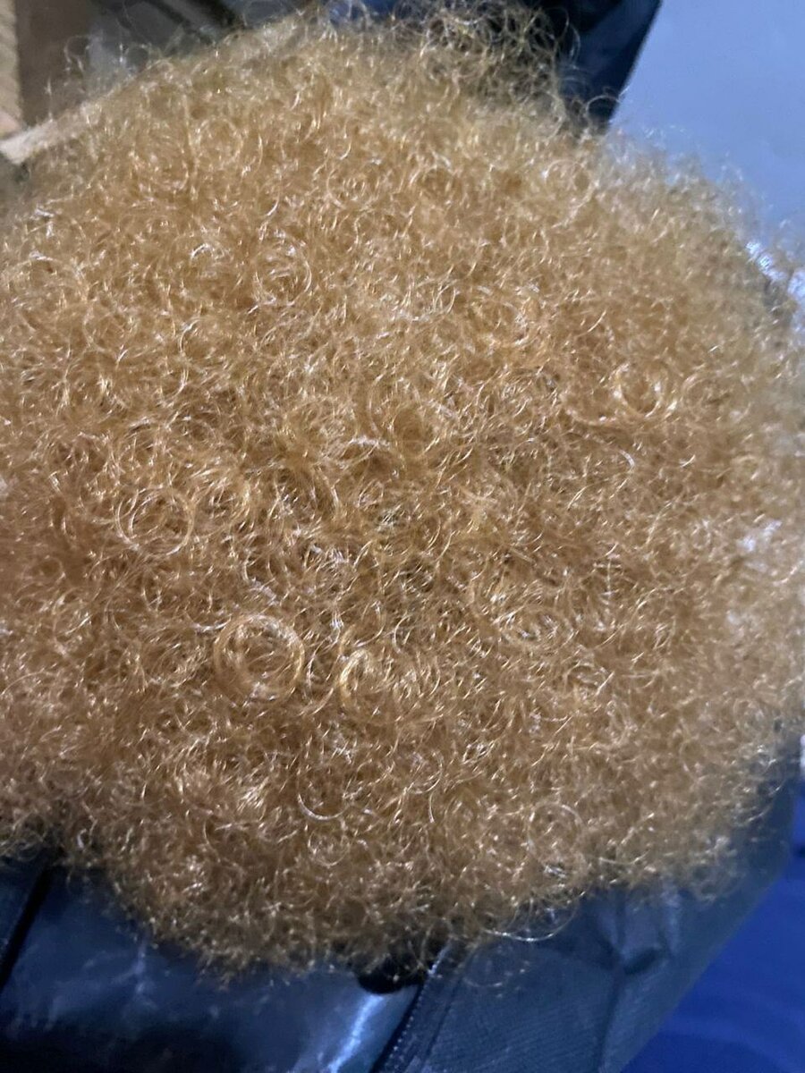 Postiche afro volumineuse