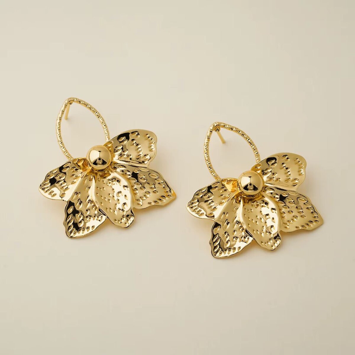 Boucles d'oreilles dorées exquises