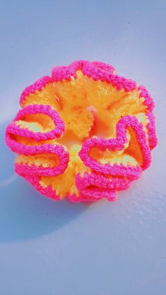 Éponge exfoliante colorée