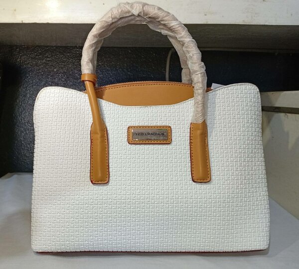 Sac à main élégant Ted Lapidus