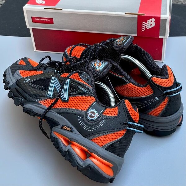 New Balance 574 noir et orange