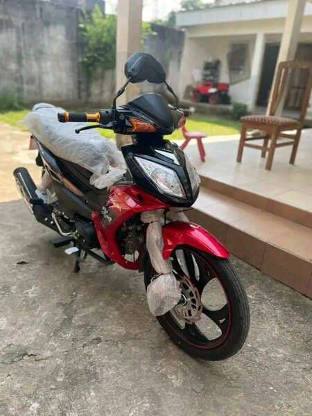 Scooter rouge Honda Wave