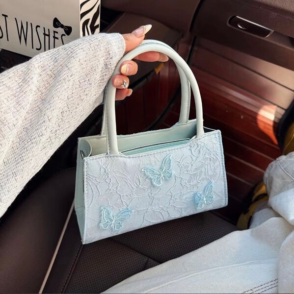 Sac à main chic papillon