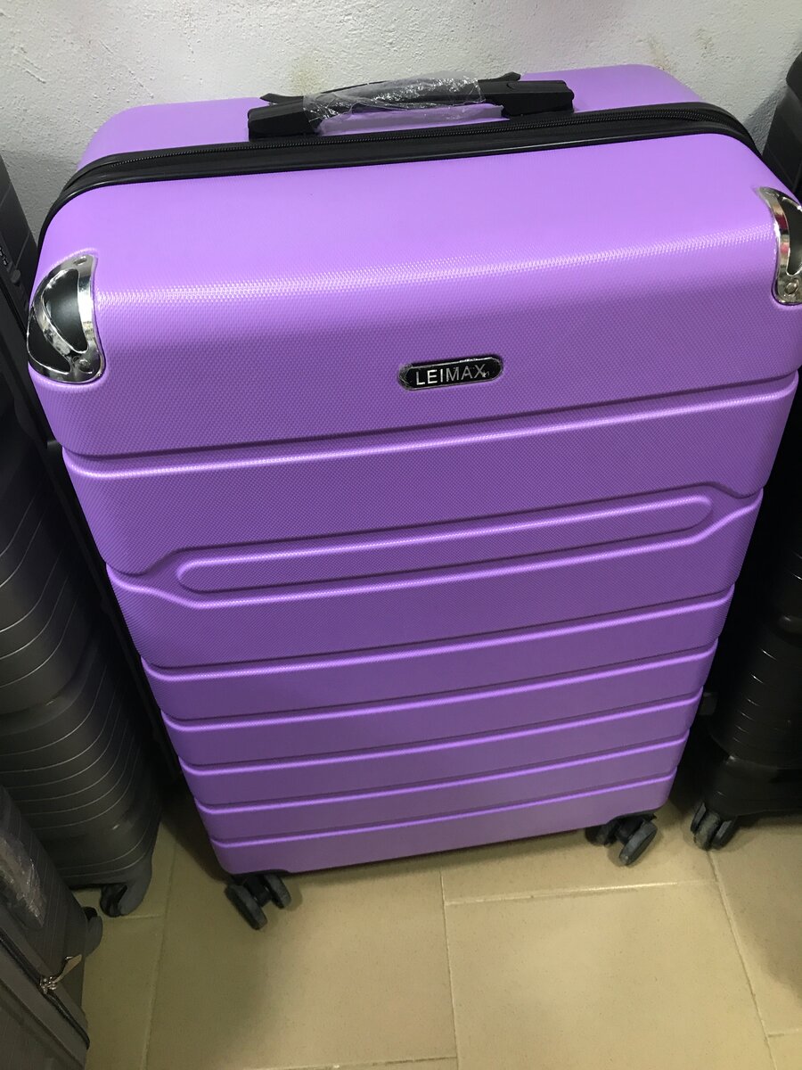 Valise à roulettes colorée