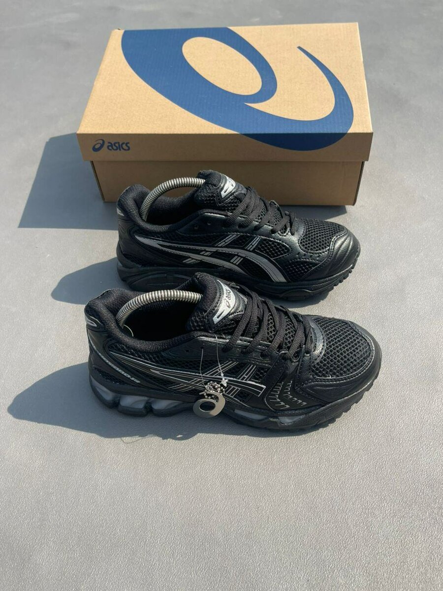 Chaussures running Asics noires