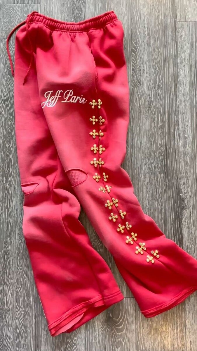 Pantalon évasé rouge fleuri
