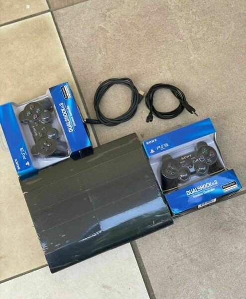 Console PS3 avec manettes