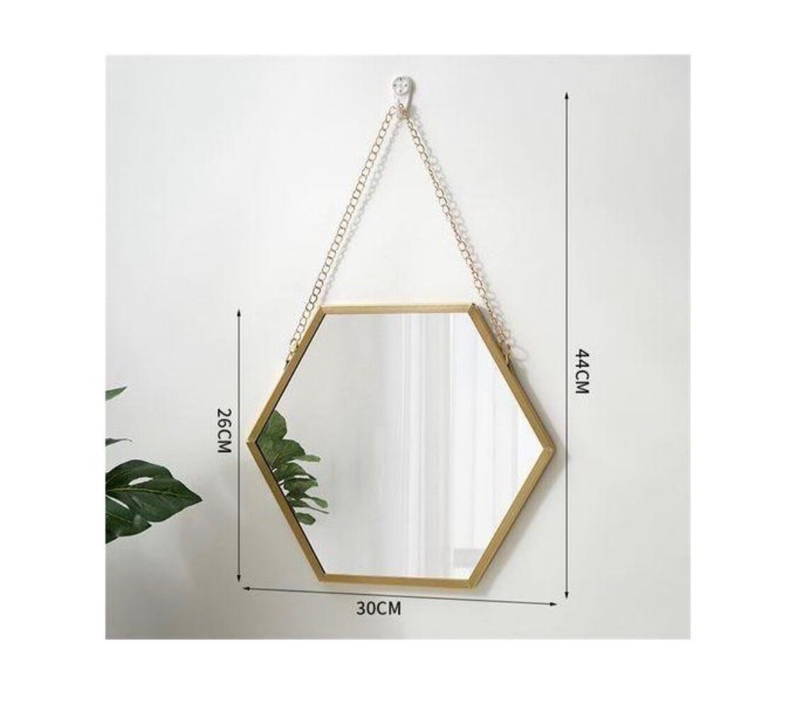 Miroir hexagonal mural en métal doré