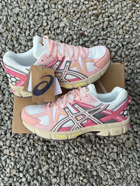 Chaussures de course roses Asics
