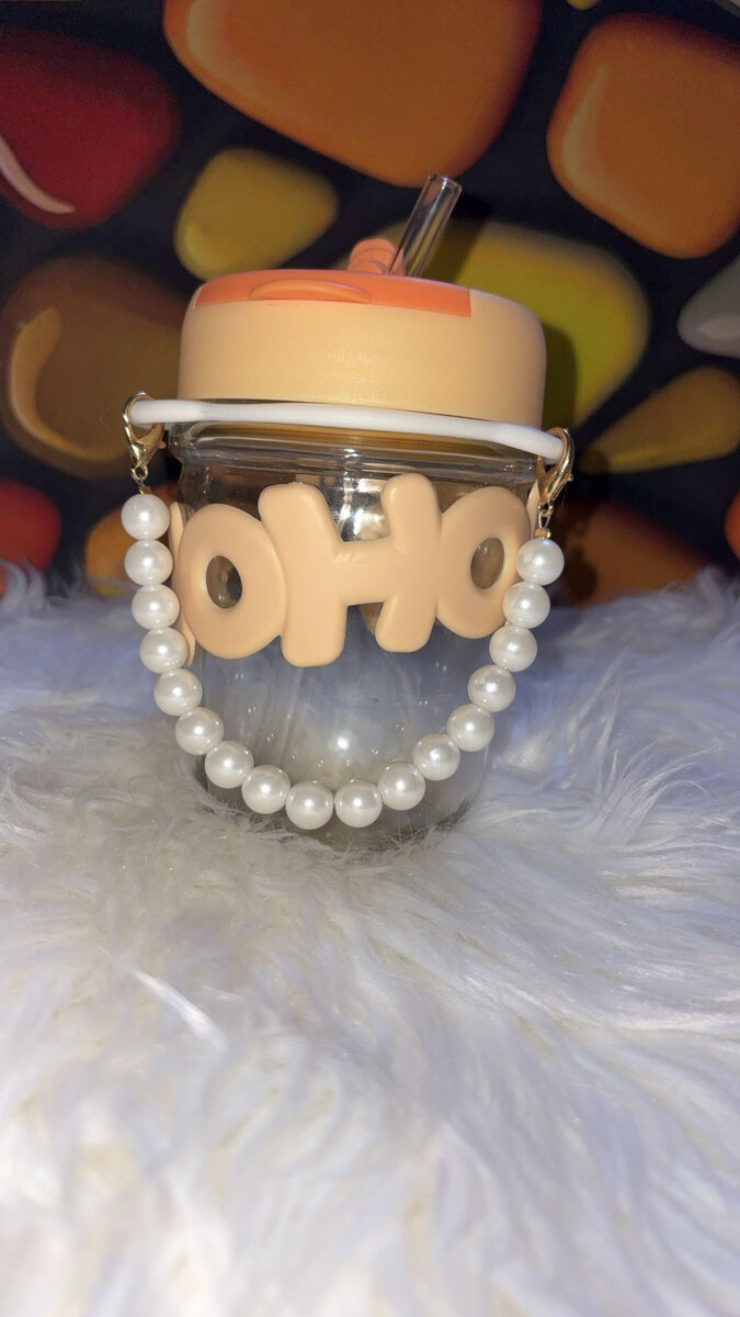 Gobelet en verre avec paille