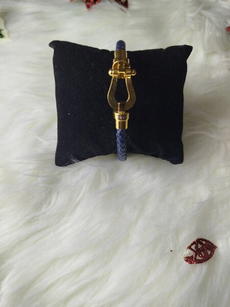 Bracelet en cuir tressé doré