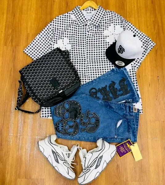 Ensemble mode homme avec chemise, jeans et accessoires