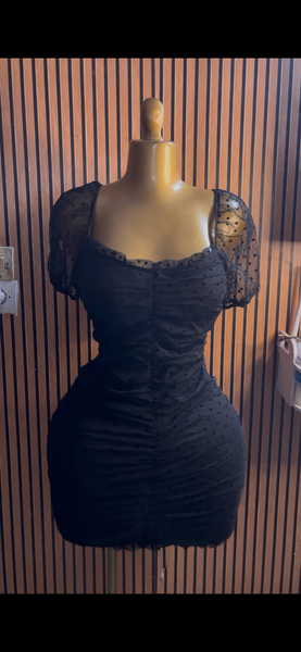 Robe noire à pois élégante