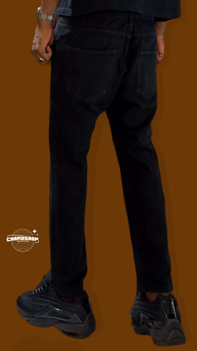 Jeans noirs déchirés homme