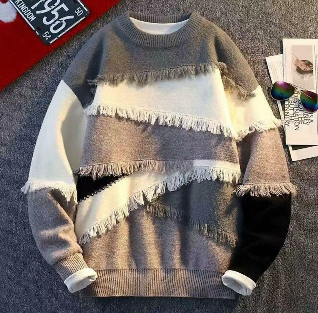 Pull en laine à franges