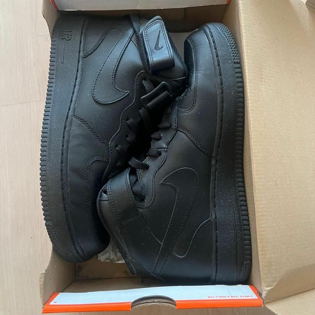 Sneakers montantes en cuir noir