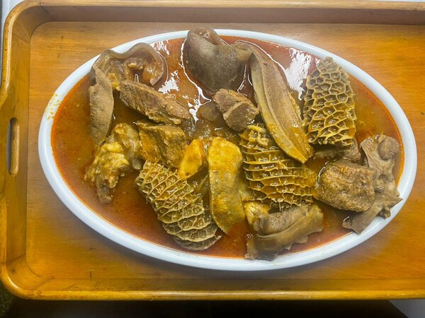 Poisson épicé et tripes