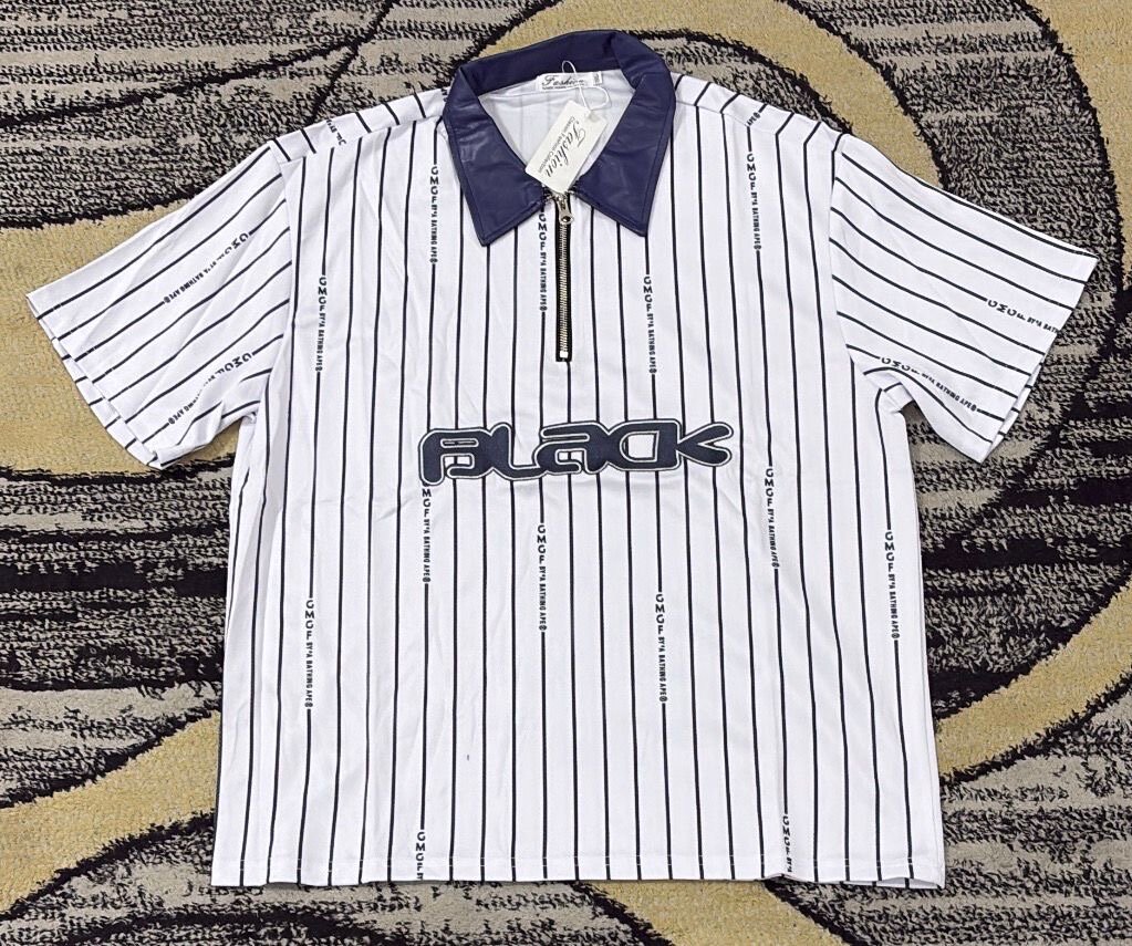 Polo rayé à col contrasté