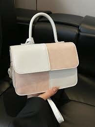 Sac à main élégant bicolore