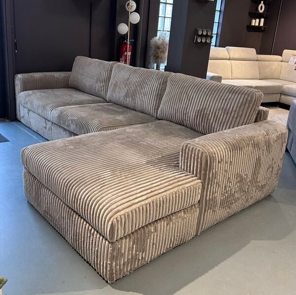 Grand canapé en velours côtelé