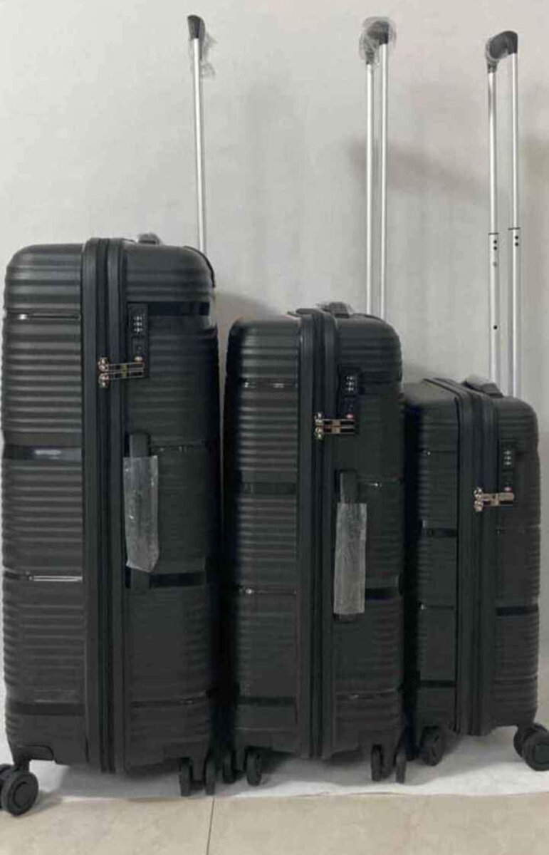 Valise rigide à roulettes