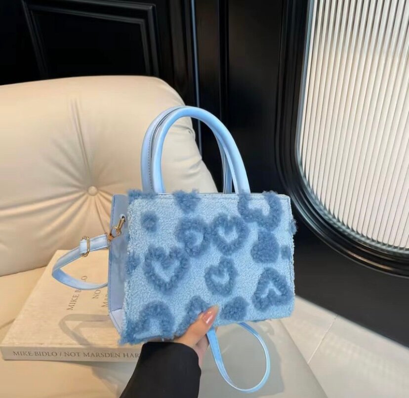 Sac à main chic papillon