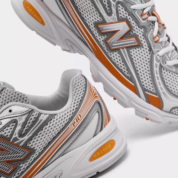 Chaussures New Balance 624 gris et orange