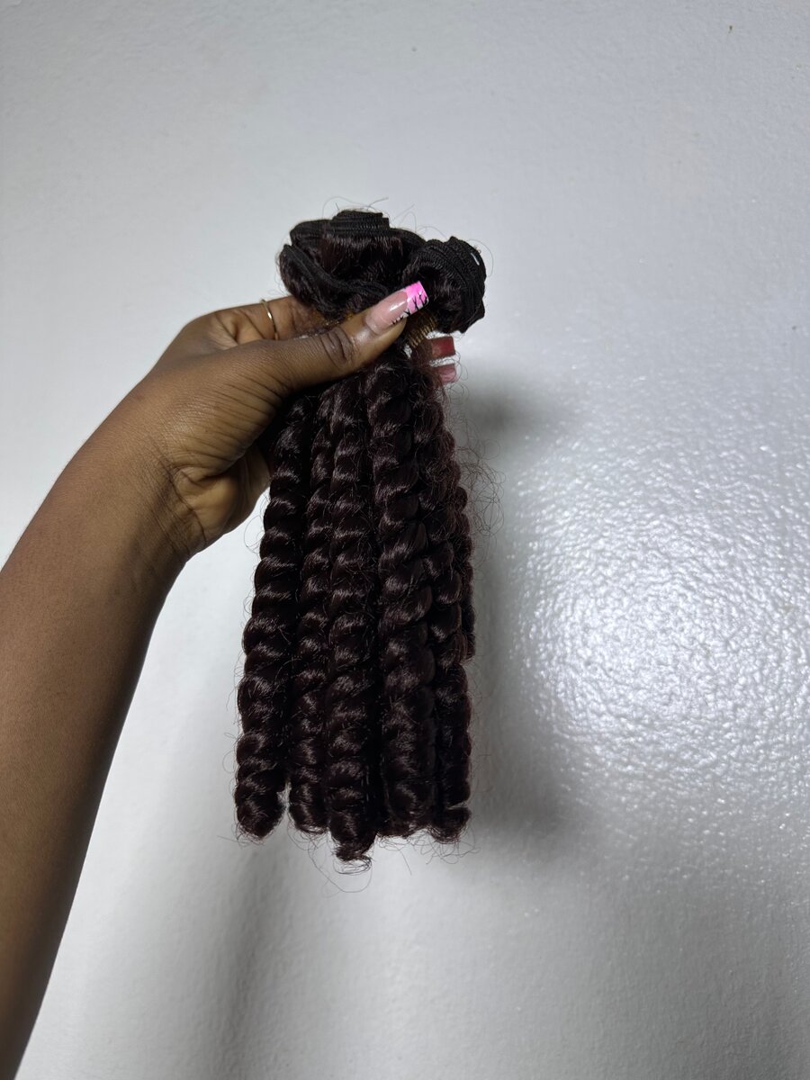 Extensions capillaires bouclés