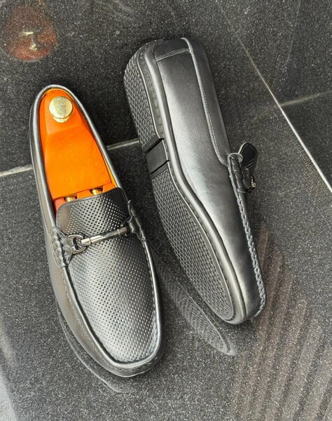 Tods en cuir perforé