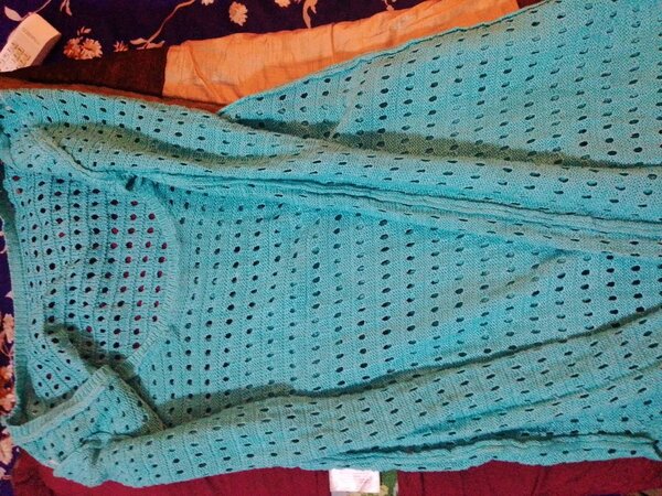 Gilet en crochet turquoise