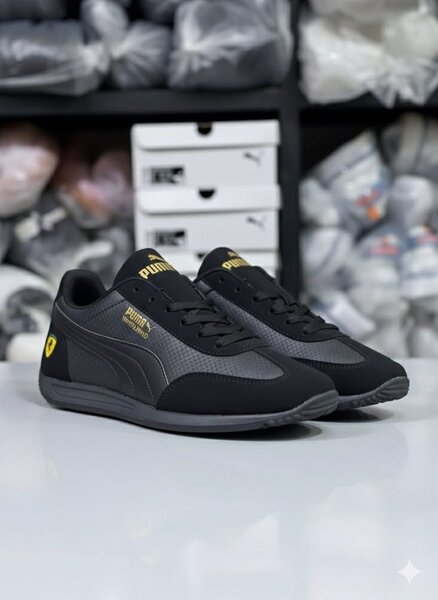 Baskets homme Puma noires