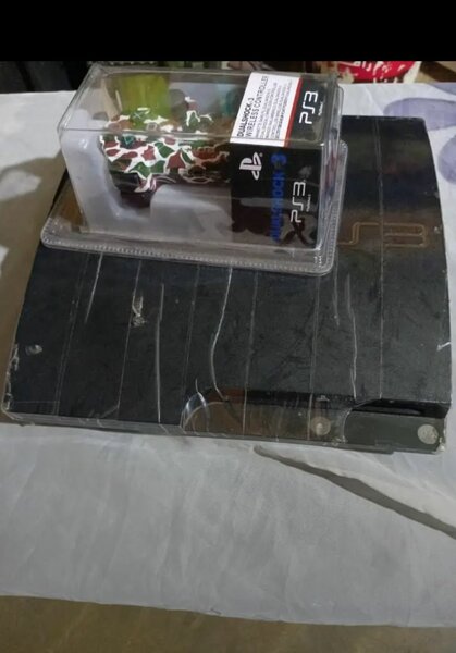 Console PS3 avec Manette DualShock 3