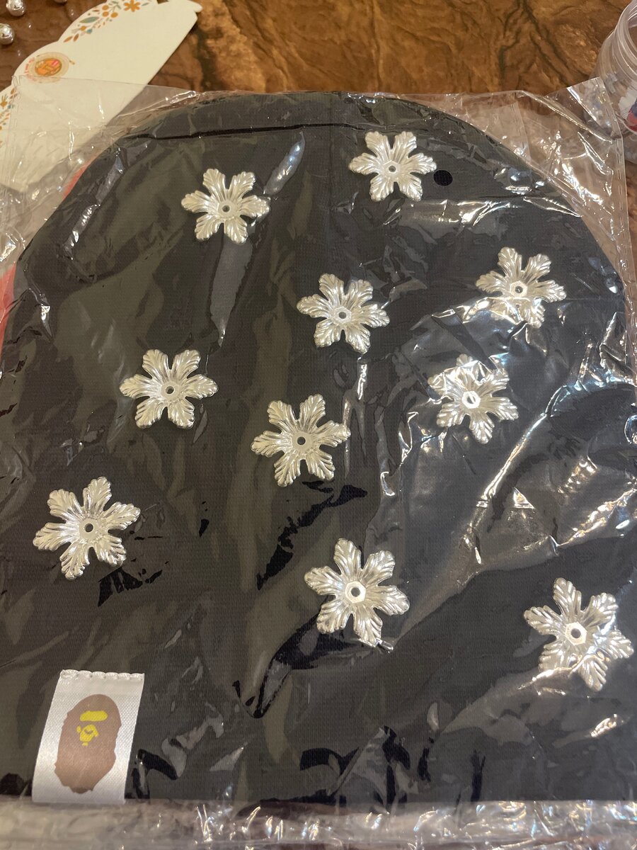 Bonnet fleuri en tricot