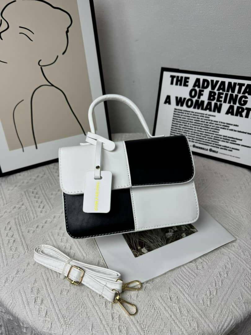 Sac à main élégant bicolore