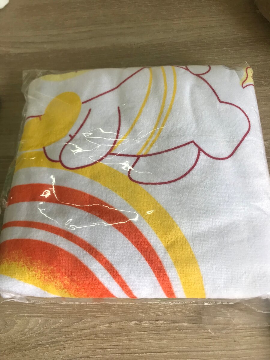 Serviette de bain motif arc-en-ciel