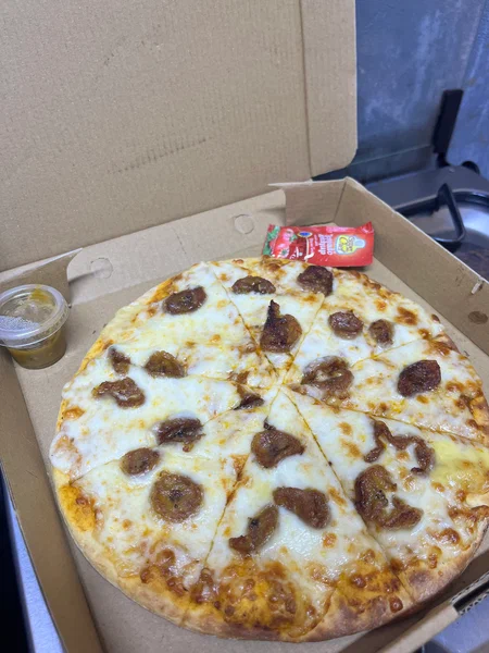 Pizza savoureuse Alloco moyen