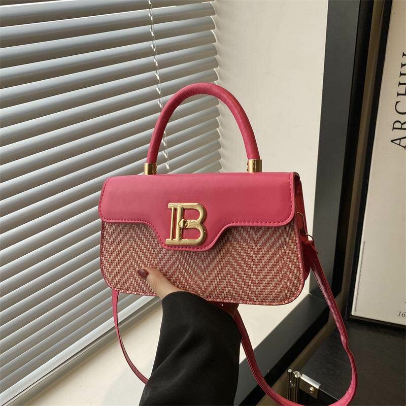Sac à main tressé en cuir