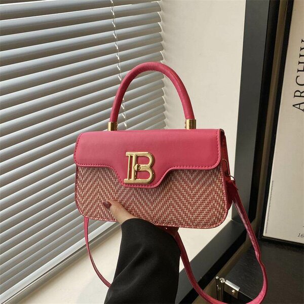 Sac à main tressé en cuir