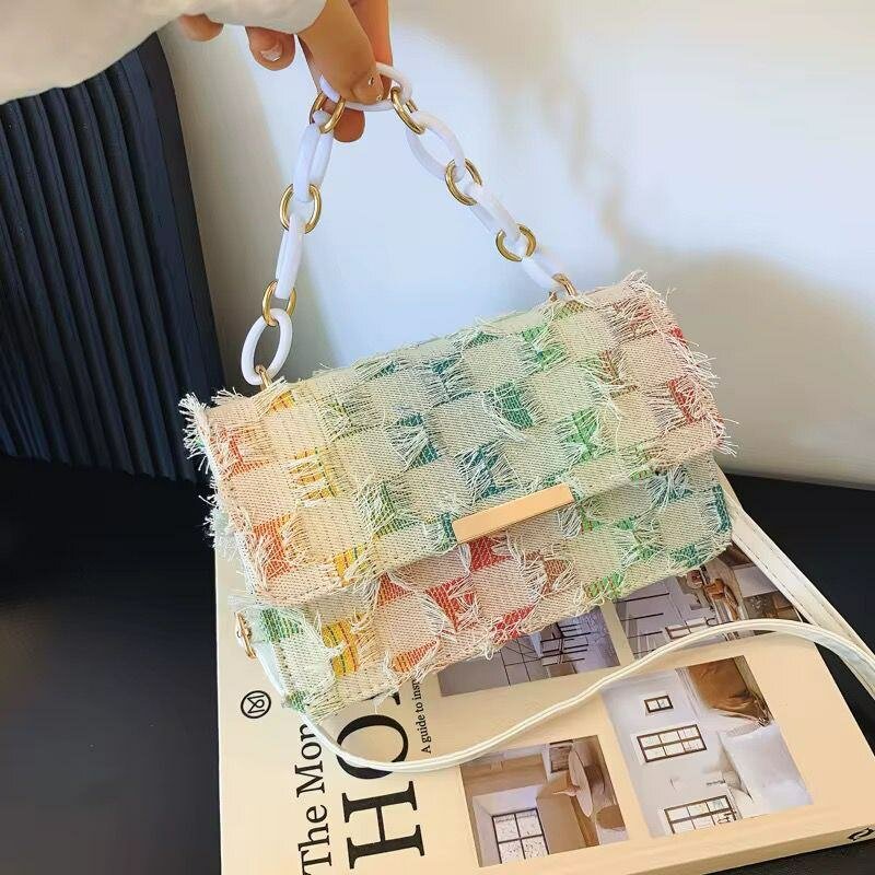 Sac à bandoulière tissé élégant