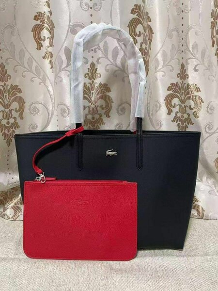 Sac Lacoste  et Pochette