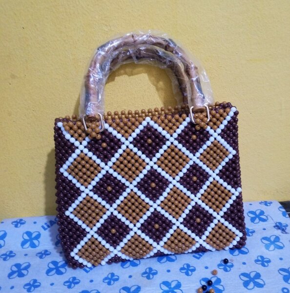 Sac à main perlé élégant