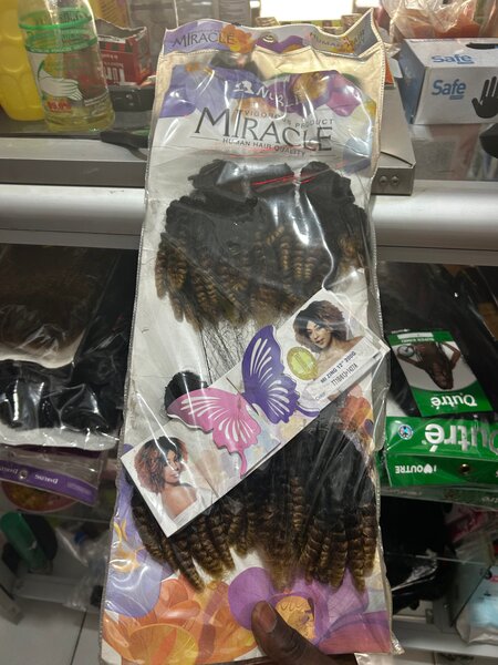 Extensions cheveux naturels bouclés