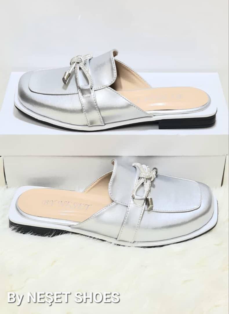 Mules élégantes en cuir